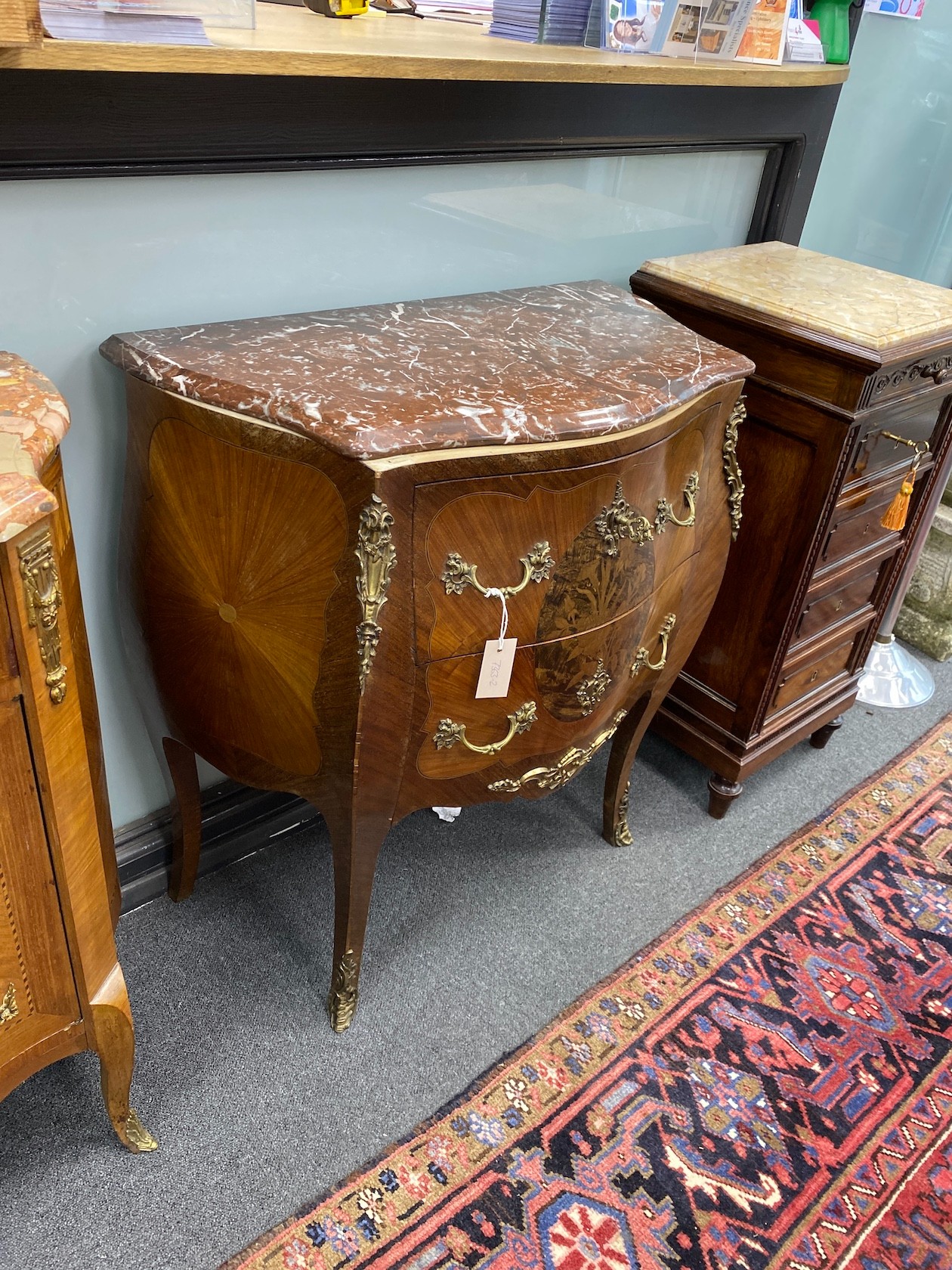 A Louis XVI style gilt metal mounted kingwood marble topped bombe commode, width 38cm, depth 39cm, height 80cm